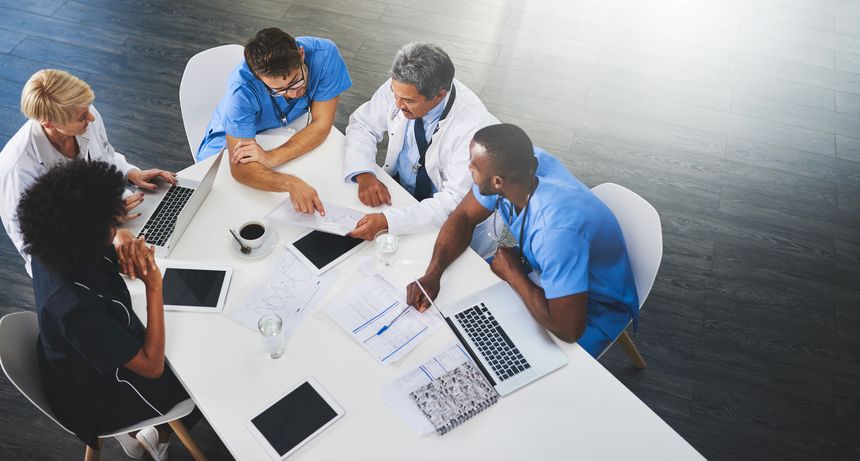 High angle shot of a team of doctors having a meeting in a hospital