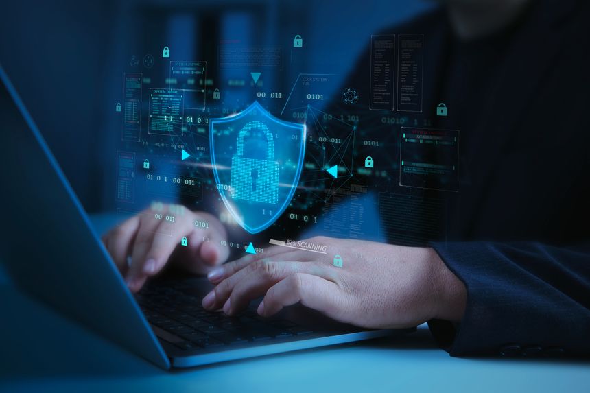 Cybersecurity shield lock secures data on laptop, real-time encryption firewall interface blocks malware and hacking threats, ensuring privacy compliance and enterprise network defense