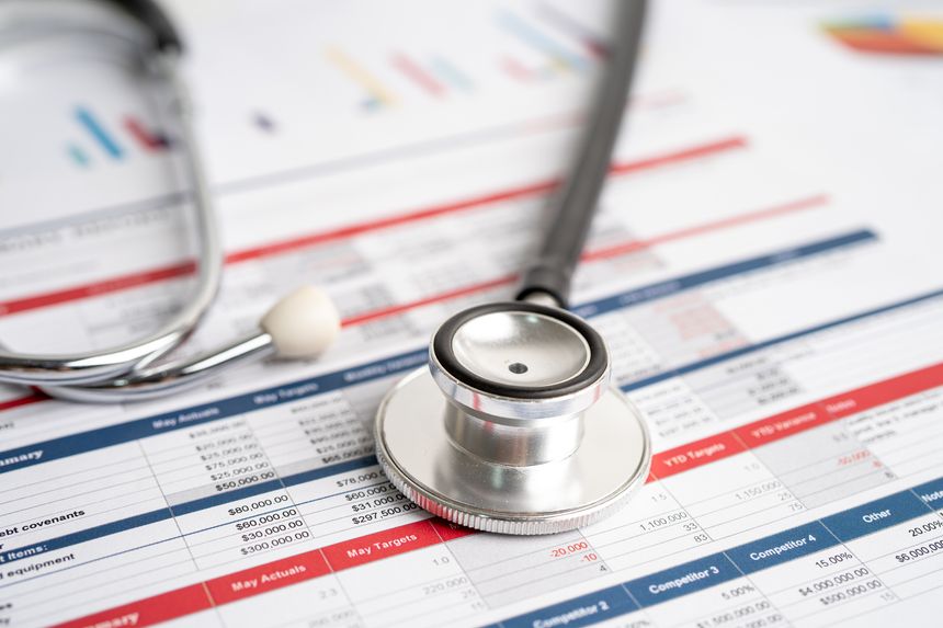 Spreadsheet table paper with stethoscope. Finance development, Banking Account, Statistics Investment Analytic research data economy, trading.