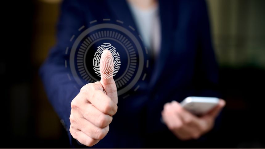 Businesswoman using biometric fingerprint scan to unlock smartphone, symbolizing future technology, cyber security, digital identity verification, and data privacy in modern professional lifestyle.