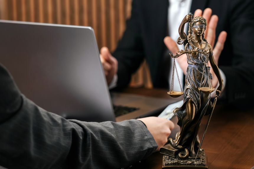 Money being exchanged in attorney’s office. Corruption and payment concept.