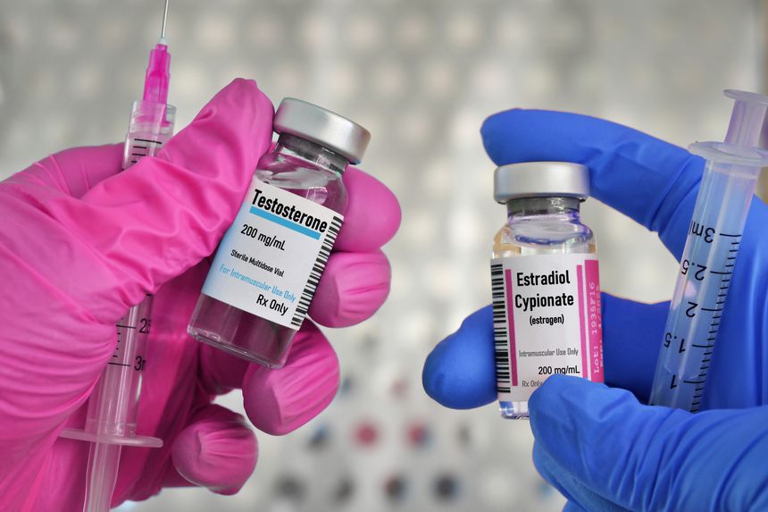Vials of testosterone male and estrogen aka estradiol cypionate female hormones for injection treatment