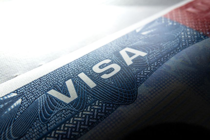 Visa in passport for world travel, US visa, tour, airport, customs, the USA visa news, America closed borders, nationality. Macro photo. High quality photo