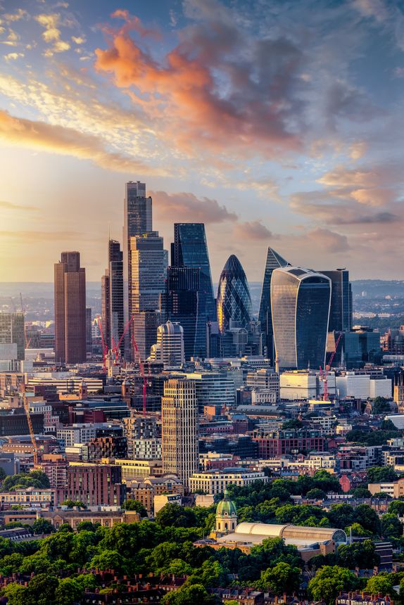 Elevated summer sunset view of the skyline at the City of London, England, from a unique viewpoint