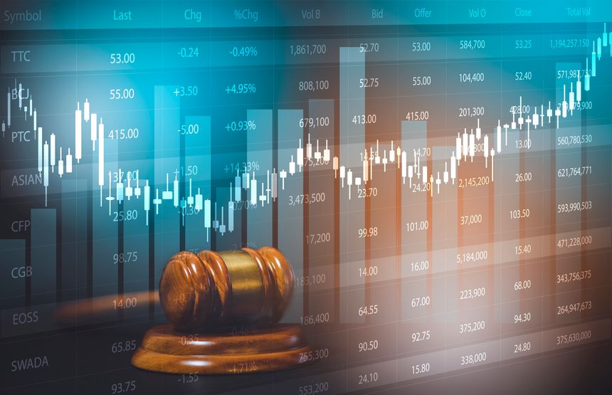 Old wood Judge hammer with Mini wood house model from model on wood table, Planning buy Real Estate, Planning to buy property and Choose the best, financial liabilities concept.