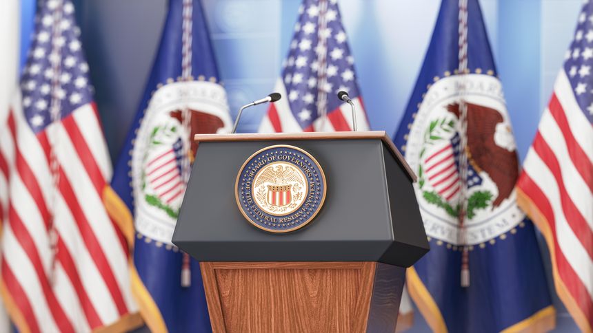Federal Reserve System Fed of USA chairman press conference concept. Tribune with symbol and flag of FRS and United States. 3d illustration