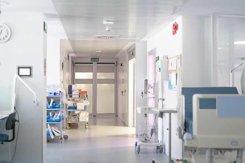 Modern hospital corridor with medical equipment and supplies, representing healthcare and medical services