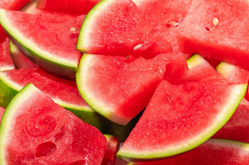 Background from slices of red ripe watermelon, summer concept