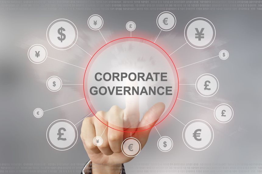 hand pushing corporate governance button with global networking concept