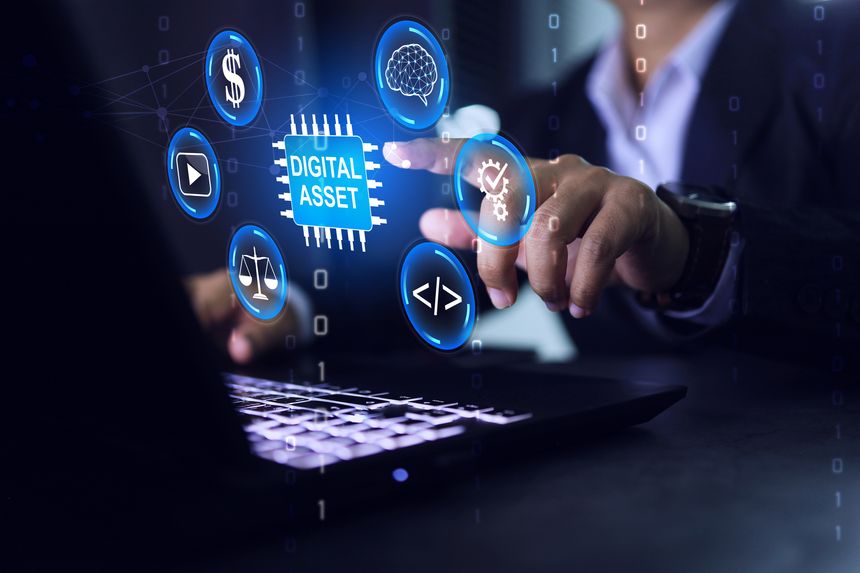 Digital asset management concept with businessman pointing on laptop screen to manage the intellectual property or patent follow legal protection