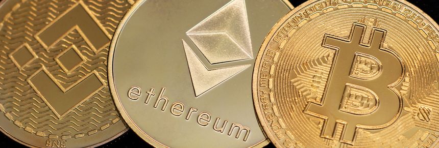São Paulo, Brazil - Circa February 2022: Cryptocurrency golden coins in close up. Bitcoin, Ethereum, Binance.
