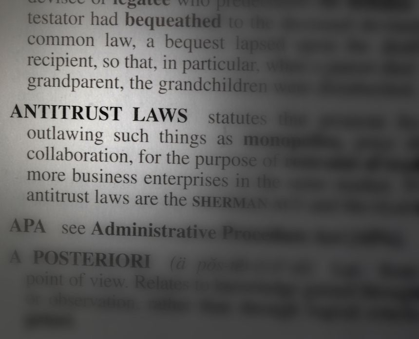 close up photo of the words antitrust laws