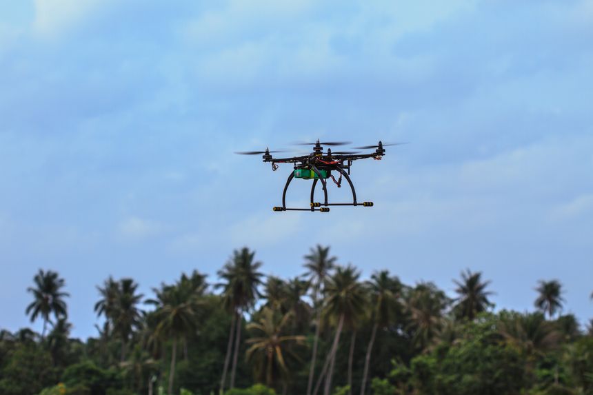flying drone with camera on the sky