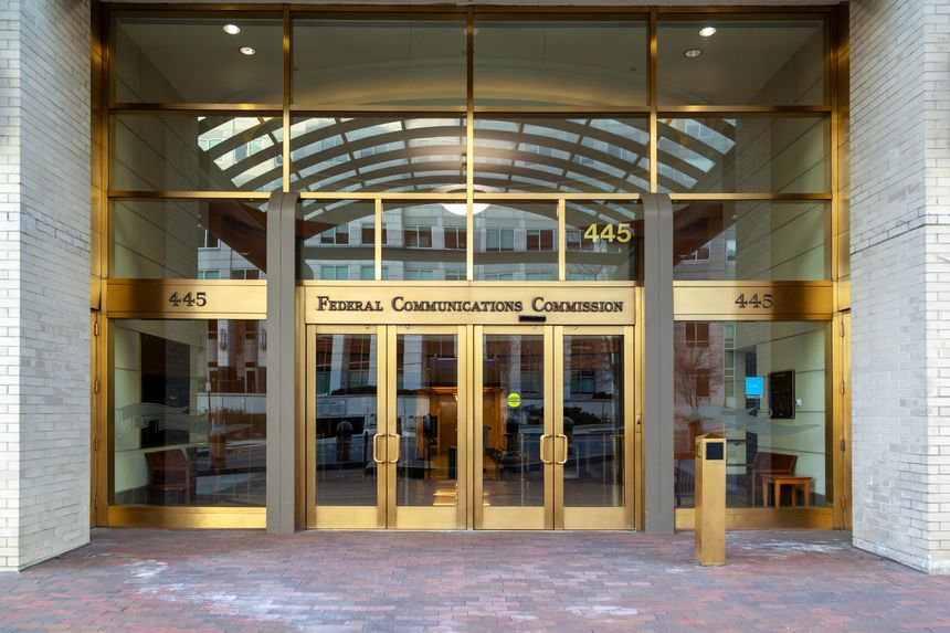 Washington, D.C., USA - February, 29, 2020: Entrance to Federal Communications Commission in Washington, D.C., USA. FCC is an independent agency of the USA government that regulates communications.