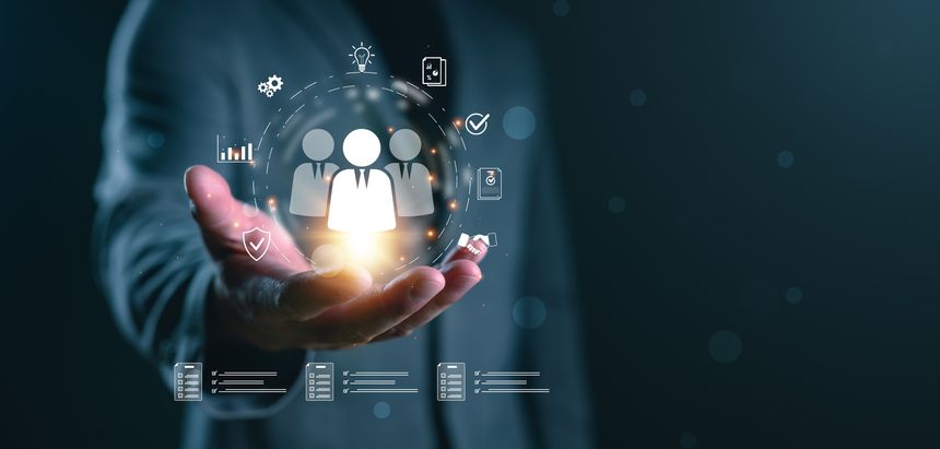 This photo captures the essence of teamwork, collaboration, and human resources, symbolized by a person holding a shining unity symbol. Great for illustrating articles on HR practices, team-building, and corporate culture for business websites.