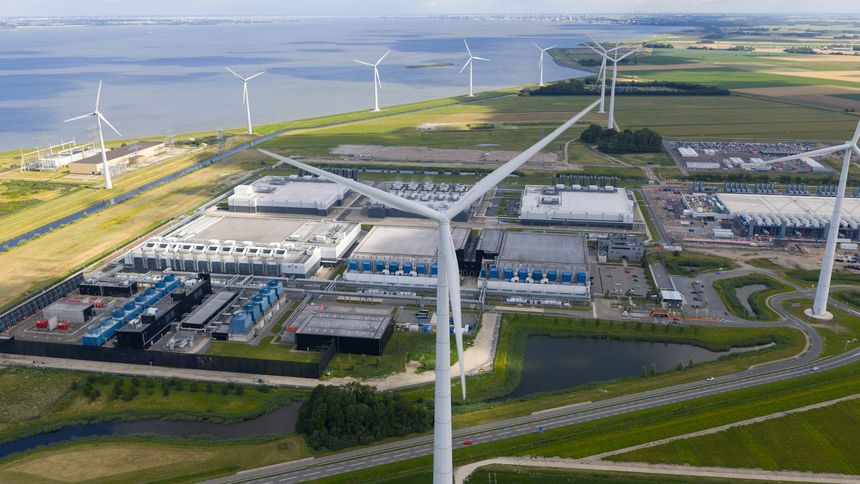 massive data center, computing center, aerial video in the Eemshaven, The Netherlands. Aerial photo.
