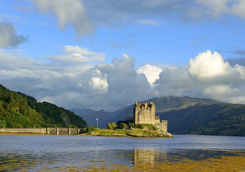 Eilean Donan Castle of Scotland, UK - Allegedly the most photographed castle in the world. Picturesque ancient castle standing on an island in a lake, United Kingdom