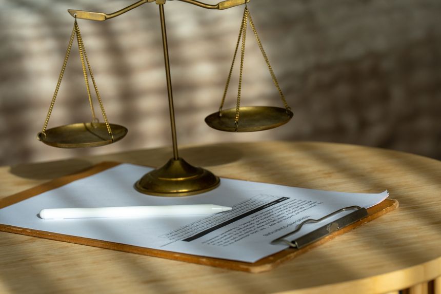 Justice scale with clipboard and legal documents symbolizes professional law office operations, legal administration, contract review, business compliance, and trusted legal representation.