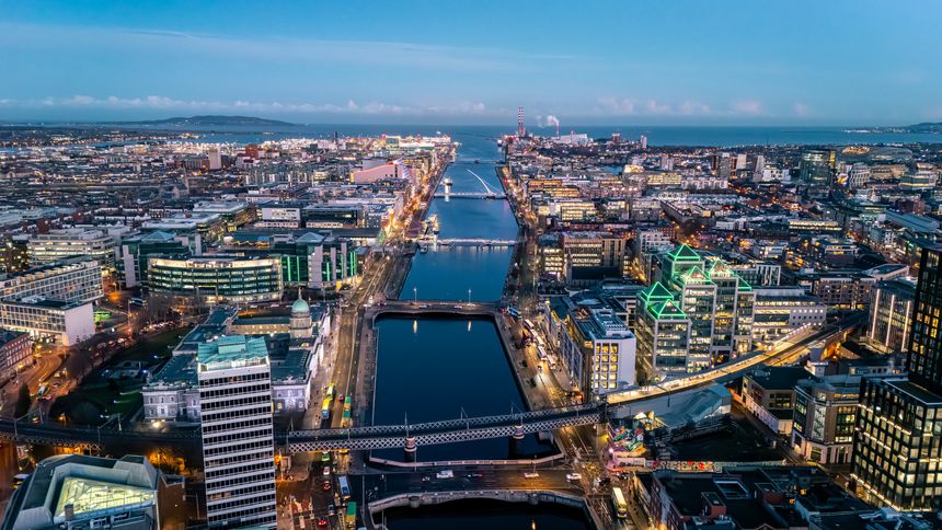 The River Liffey is Dublin's central artery, a historic waterway that defines the city's layout and civic identity. Spanned by the 1816 Ha'penny Bridge, it flows from the Wicklow Mountains to the Irish Sea, serving as a symbol of resilience and local connection.