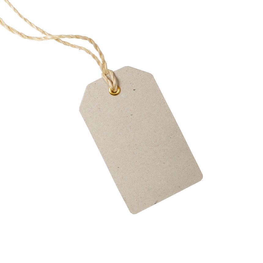 Empty tag on a string. Blank sale or price tag made of cardboard.