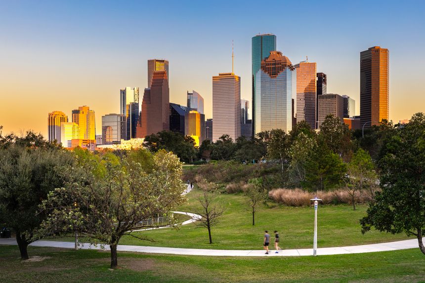 Houston Downtown modern business city with skyscraper city scape with park view from Buffalo Bayou center of Houston city, Texas, United States of America, US at sunset time