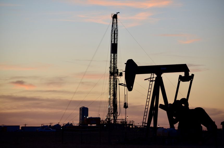 Drilling rig and pump jack located in South Plains of West Texas