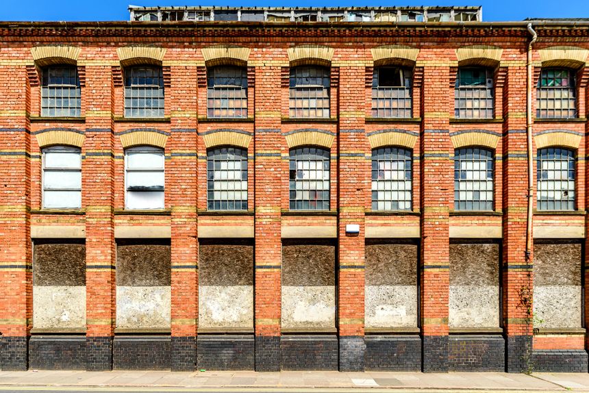 old brick factory building wall in england uk.