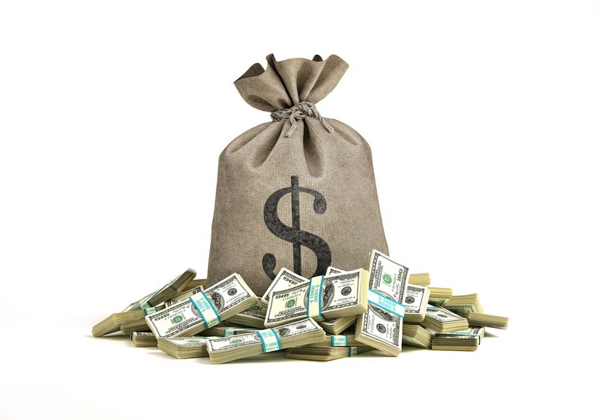 Money bag with many wads of banknotes in front of it. 3D illustration on white background.