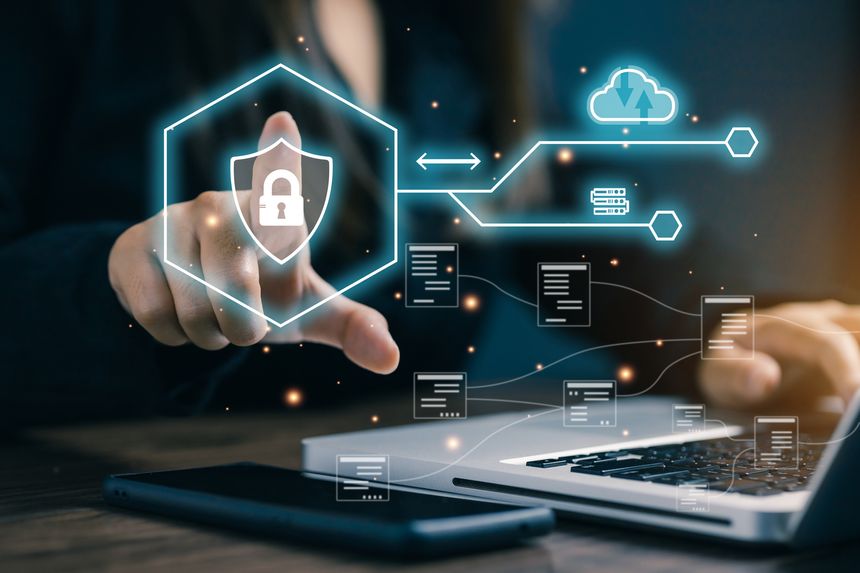 A businesswoman touches digital shield with cloud and server icons, representing data security, cloud computing, file protection, and safe information transfer in modern technology.