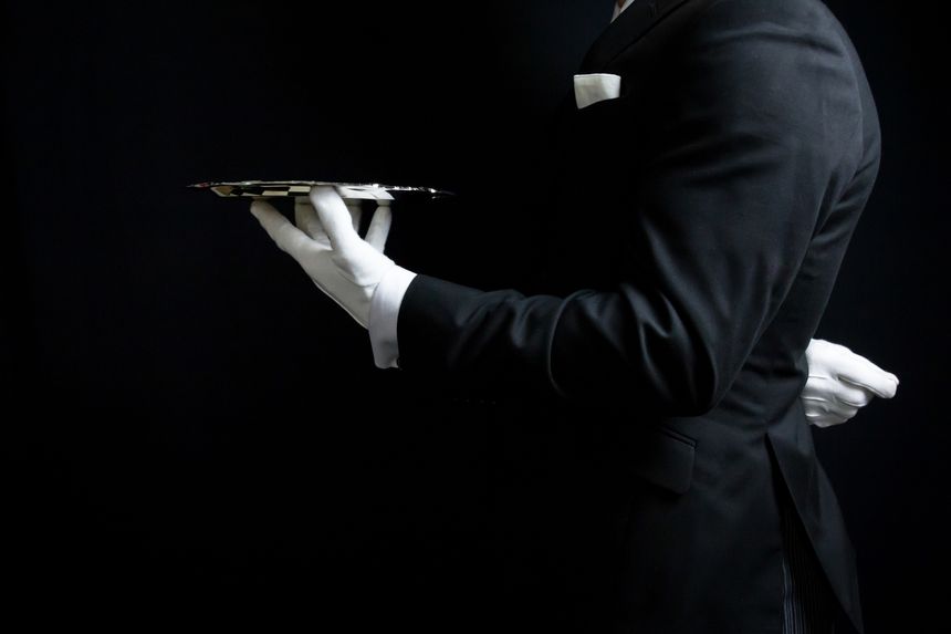 Profile of Professional Butler Holding Tray