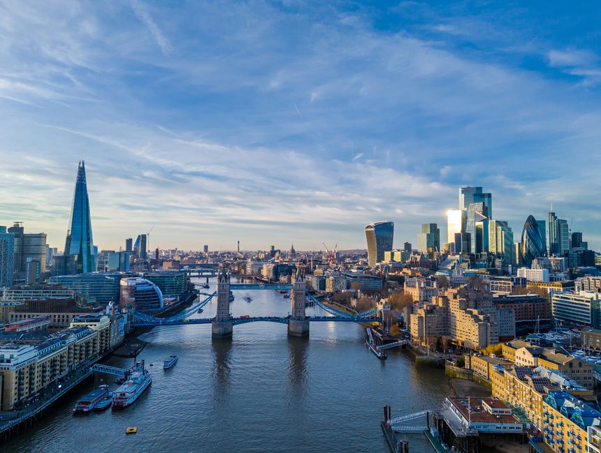 London city skyline panorama. Aerial drone view of panoramic background of London. Iconic skyline with skyscrapers, river Thames, historic landmarks