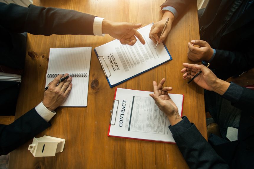 Group of business people and lawyers discussing contract papers ,Consultation between a male lawyer and businessman concept