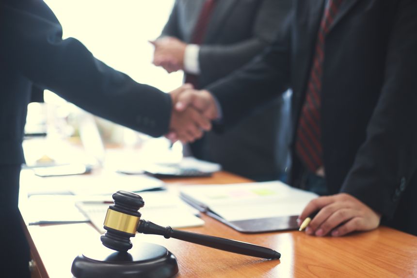 Close-up of handshake of businessman