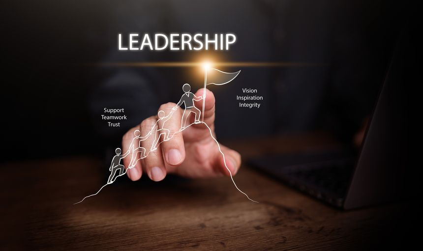 Business hand touching leadership teamwork drawing with people climbing mountain to flag. Support, trust, vision, inspiration, integrity, motivation, guidance, and business success strategy concept.