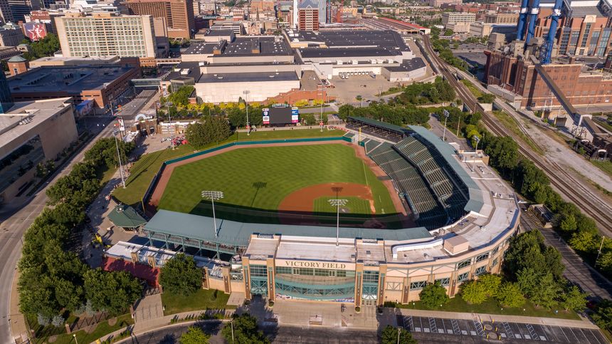 Indianapolis, United States – July 11, 2025: Victory Field baseball park surrounded by downtown Indianapolis buildings. Home of the Indianapolis Indians
