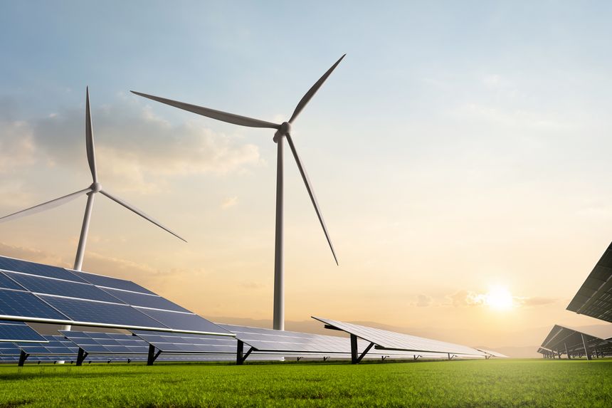 Solar and wind farm at sunset a concept of energy transition for an ESG strategy and decarbonization to achieve net zero future