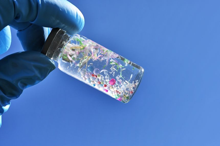 Vials containing water samples contaminated with microplastics, plastic pollution