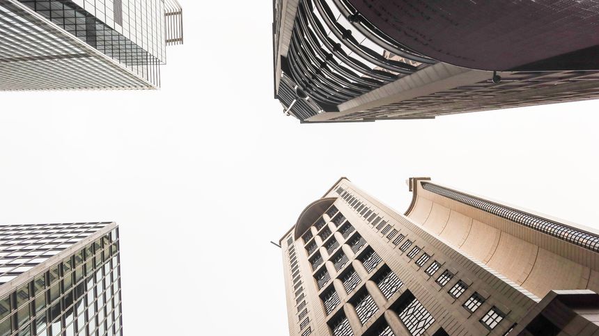 Central, Hong Kong- May 1 2025: photo taken from a low angle looking up to sky with copy space showing Skyscrapers at the corner including Bank of China Building, Cheung Kong Tower, HSBC Tower
