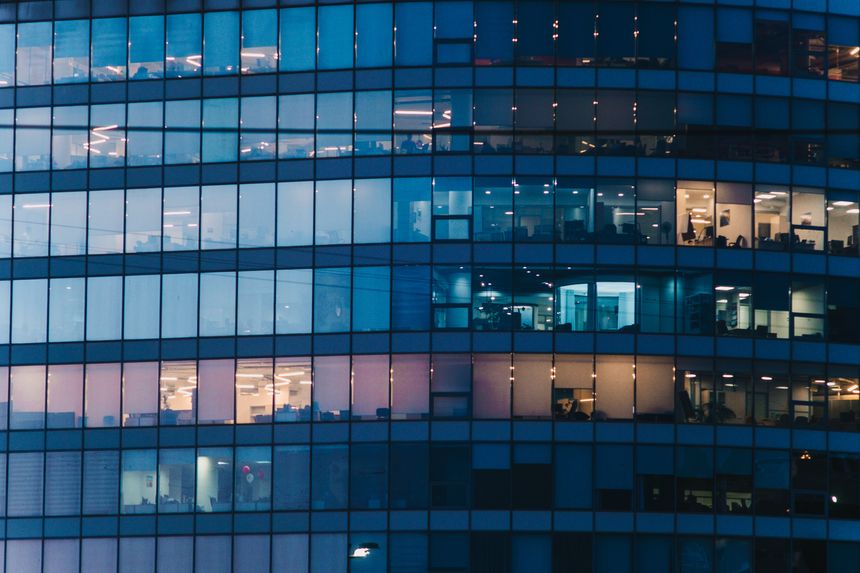 Office windows of the skyscraper at sunset.