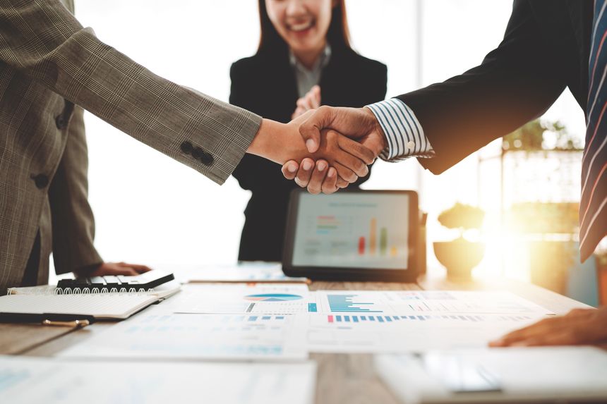 Business handshake concept. Illustration of business people working together. Successful deal after a good meeting. Brainstorming of young modern group. Team meeting to achieve goal. Business people