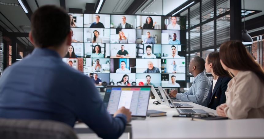 African American Woman Discussing Marketing Strategies In Virtual Team Meeting.